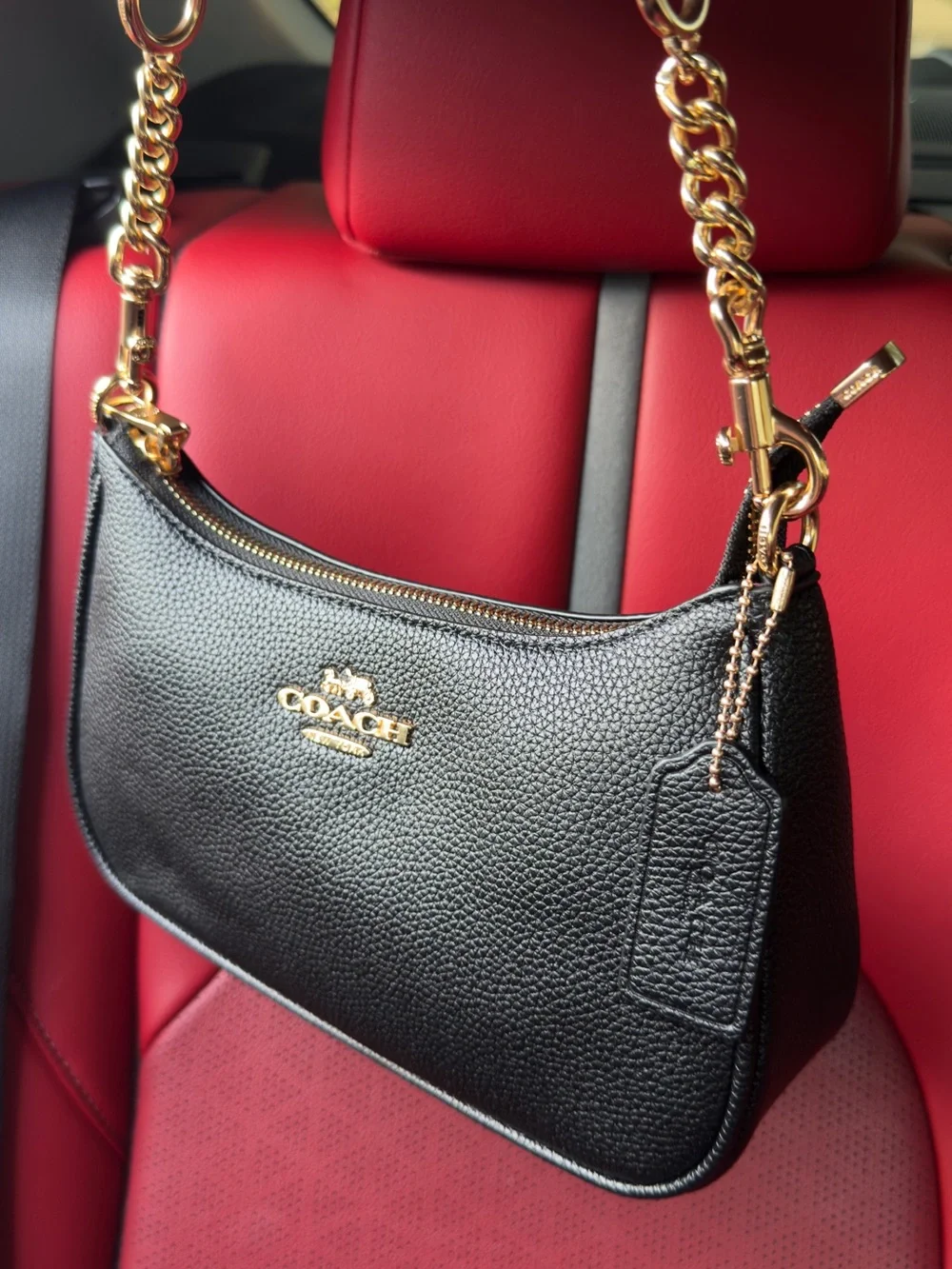 Coach Black Pebbled Leather Shoulder Bag with Gold Chain Accents